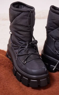 Prettylittlething Black Round Toe Quilted Lace Up Chunky Platform Snow Boots Black -Pretty Soles Shop 24bf8803ff150a967111c04f53c388d7f7663fed cnf9089 3