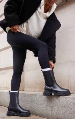 Prettylittlething Black PU Round Toe Cleated Chunky Sole Ankle Boots Black -Pretty Soles Shop 68290c23b445946ba2bd0ff7525176bd4f338170 cnb1675 2