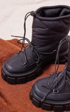 Prettylittlething Black Round Toe Quilted Lace Up Chunky Platform Snow Boots Black -Pretty Soles Shop 8aeb69e8a331e2f1443e1ffbcf72a732b237a6c9 cnf9089 4