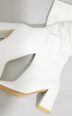 Prettylittlething White High Block Heel Knee High Boots White -Pretty Soles Shop a677d06397e4495cc5ed586270da7b3b191454f3 cmq3743 4