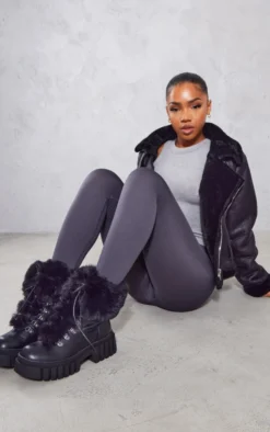 Prettylittlething Black PU Round Toe Faux Fur Detail Chunky Ridged Sole Combat Ankle Boots Black