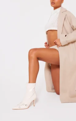 Prettylittlething Cream Wide Fit Faux Leather Point Toe Buckle Detail Tab Ankle Heeled Boots Cream