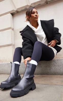 Prettylittlething Black PU Round Toe Cleated Chunky Sole Ankle Boots Black -Pretty Soles Shop f173fbf93f1595fb2da5374c350a708c616196b8 cnb1675 3